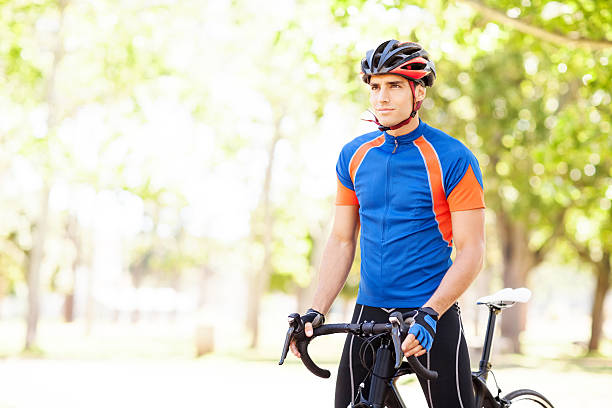 istock Male Cyclist Riding Bicycle At Park 519130123