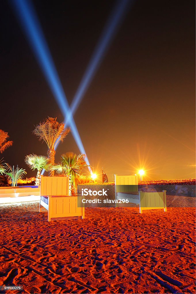 Playa del hotel de lujo en iluminación nocturna de Palm Jumeirah - Foto de stock de Actividades recreativas libre de derechos