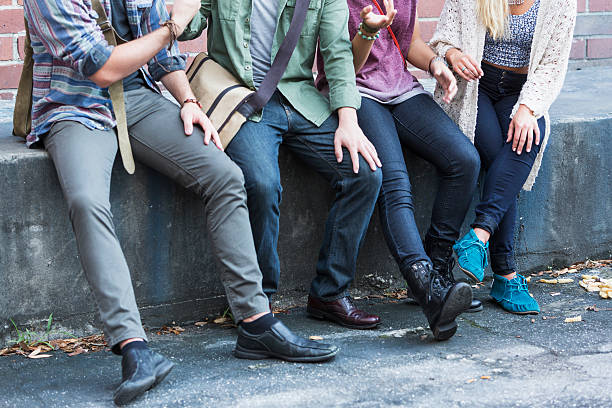 istock Four young adults hanging out in city 519135243