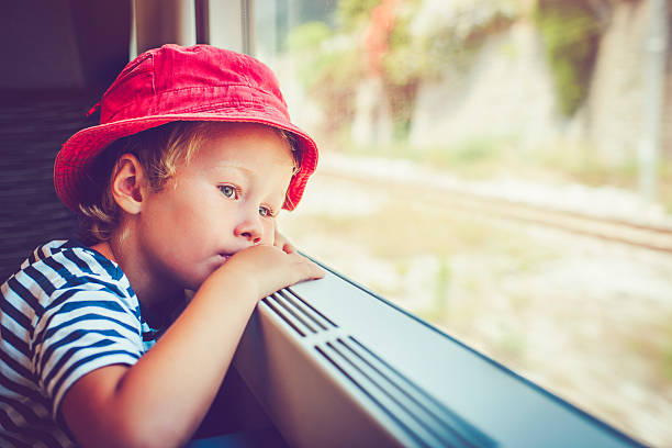 Child in train Little boy traveling in train passenger train photos stock pictures, royalty-free photos & images
