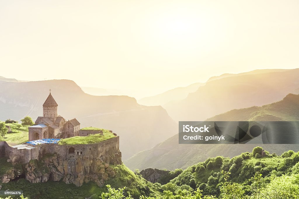 Ancient monastery. Tatev. Armenia Ancient monastery in setting sun. Tatev. Armenia Architecture Stock Photo