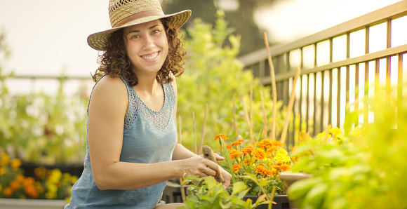 Young woman gardening outdoors