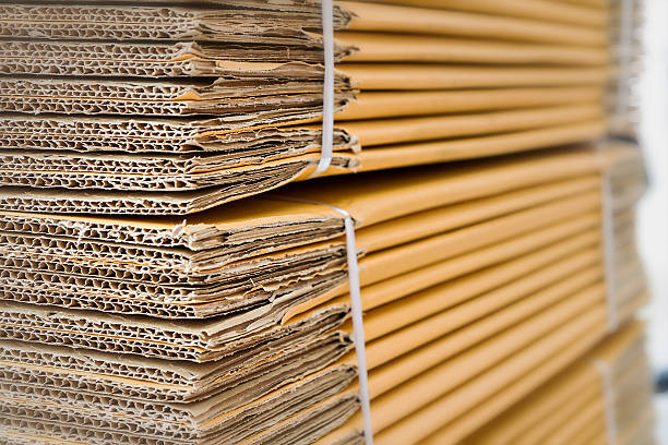 istock Brown corrugated cardboard with selective focus and blur effect 519158320