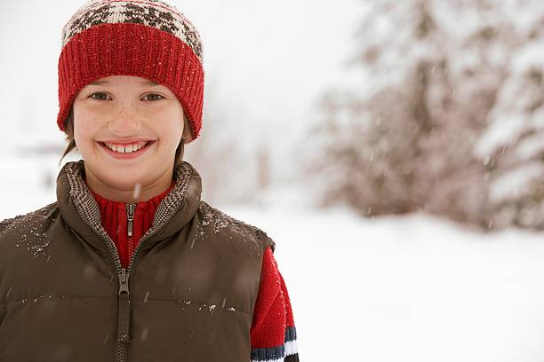 istock Boy portrait in the snow 519159600