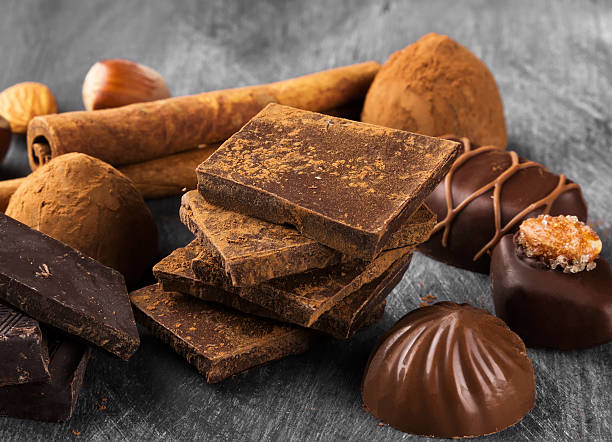 istock Various confectionery: chocolate, candies on a dark background 519161006
