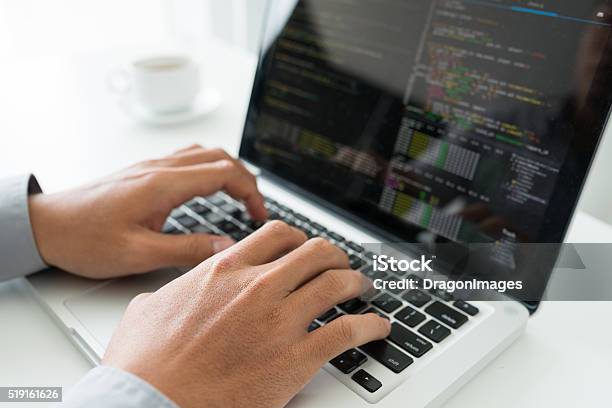 Coding Stock Photo - Download Image Now - Coding, Men, Computer Programmer