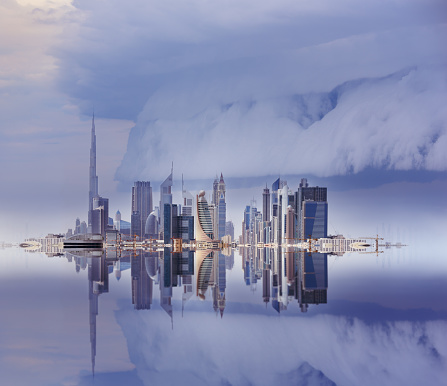 Dubai skyline reflected, stormy sky