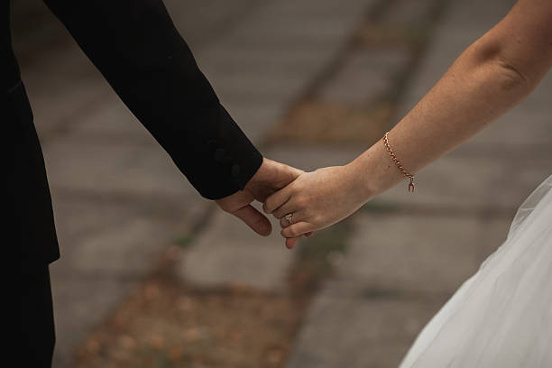 istock Happy wedding couple hugging and smiling each other on the 519162680