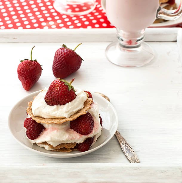 istock cake of waffles with strawberries and cream 519163352