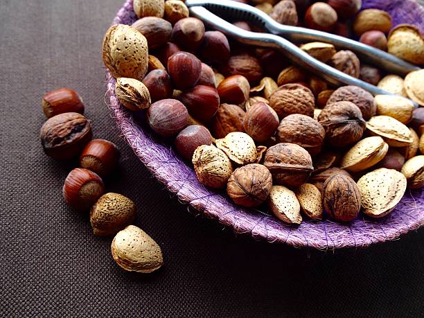 Mix of nuts, almonds and walnuts with nutcracker