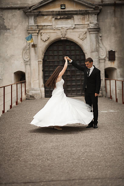 istock Happy wedding couple hugging and smiling each other on the 519164132
