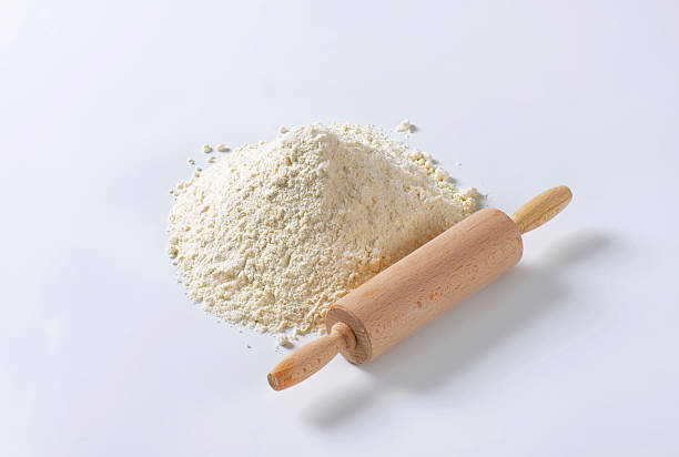 istock Pile of wheat flour and rolling pin 519165140