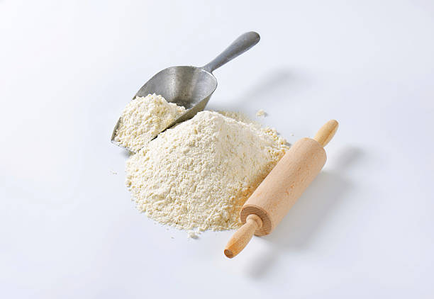 istock Pile of wheat flour and rolling pin 519165184