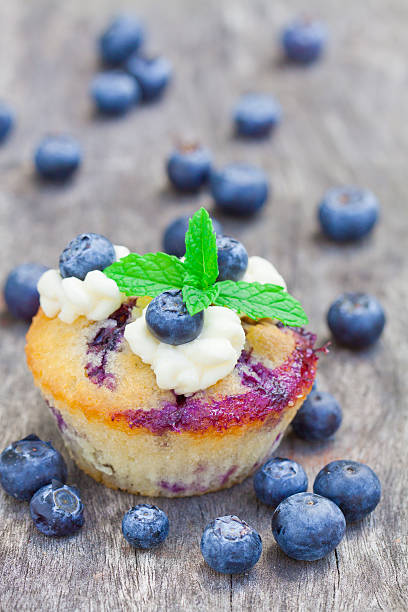 Sweet and silky homemade purple velvet cupcakes muffins with ube jam, selective focus