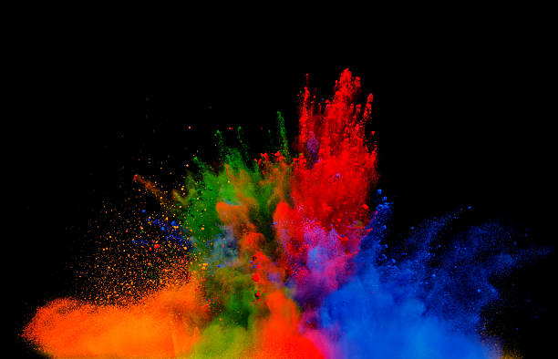 istock Explosion of colored powder on black background 519168746