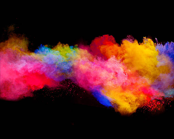 istock Explosion of colored powder on black background 519168802