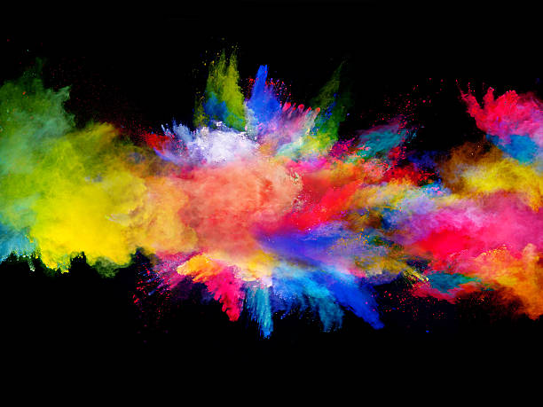 Explosion of colored powder on black background