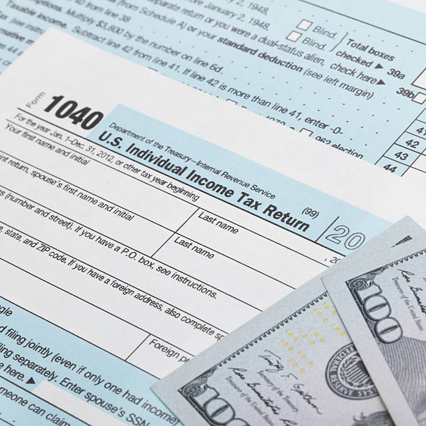 istock Tax Form with dollars - 1 to 1 ratio 519172659