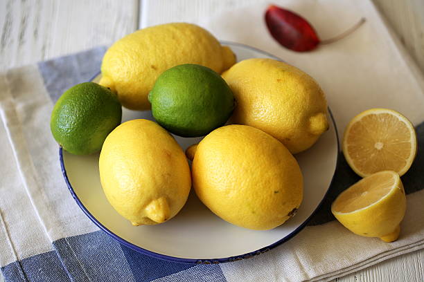 istock Limes and lemons in a bowl 519174361