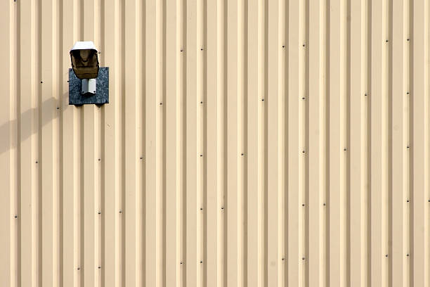 istock Street lighting on metal facade 519174793