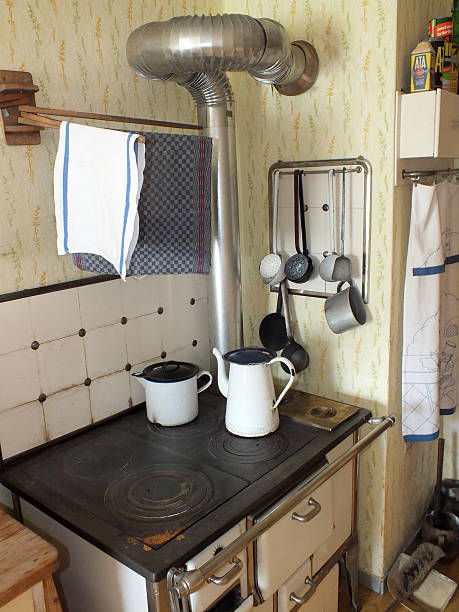 istock Old kitchen with stove and old pots 519175349