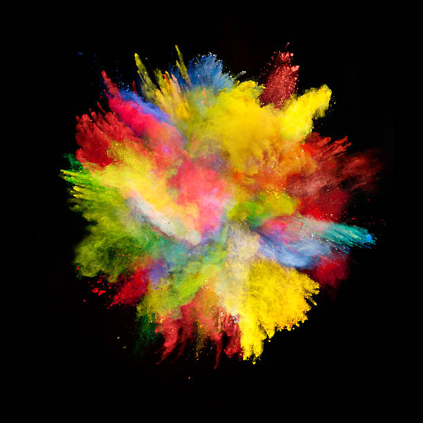 istock Explosion of colored powder on black background 519182340