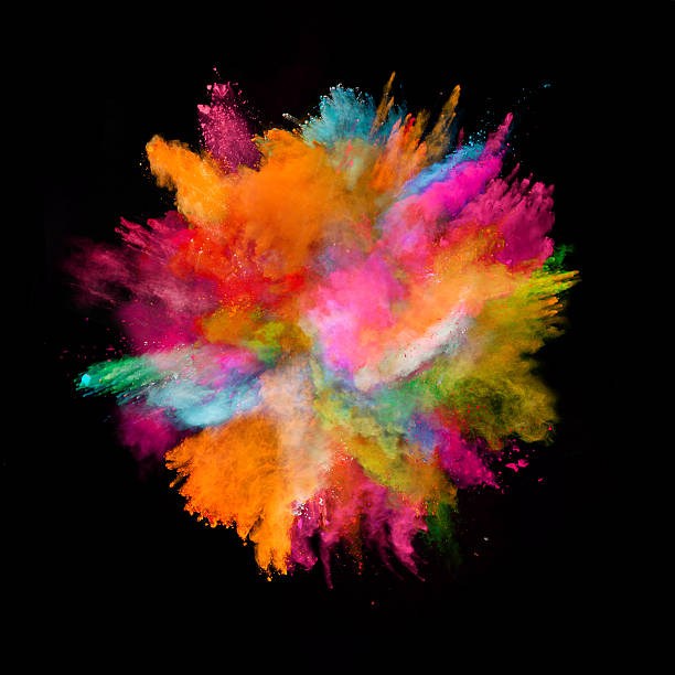istock Explosion of colored powder on black background 519182534
