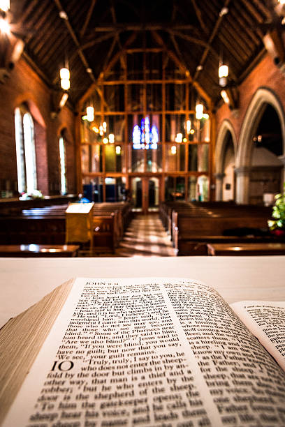 istock Open Bible on Altar inside Anglican Church 519185086