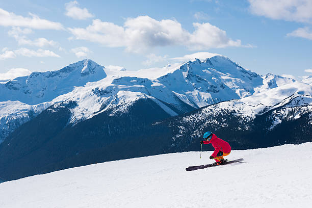 istock Female athlete skiing in the mountains 519185488