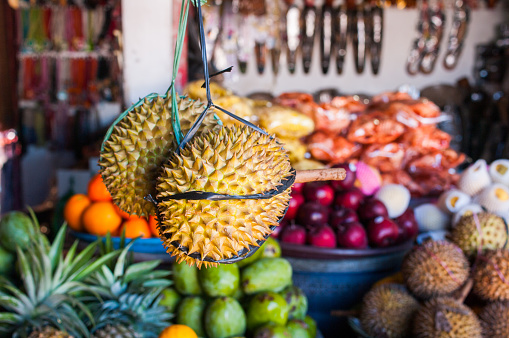 A fruit and vegetable stand at a local market.