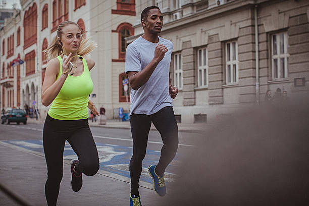 istock Couple jogging in the city 519187180