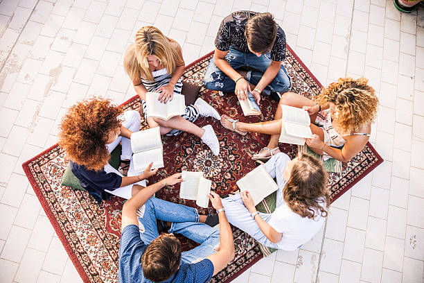 istock Friends have a public reading together 519187612