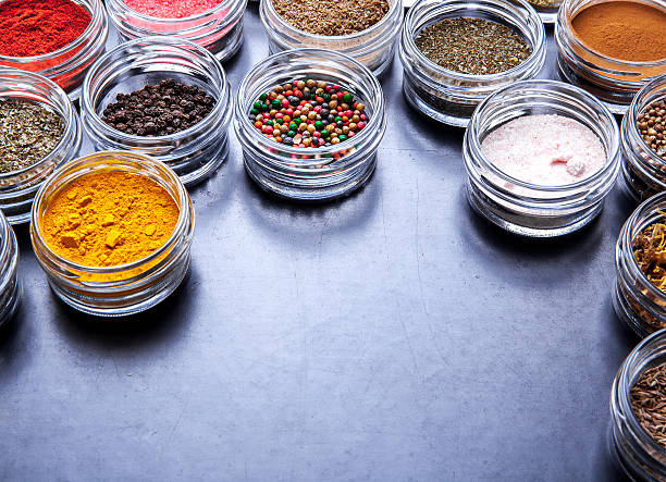 istock Spices on black background in jars. Food 519188202