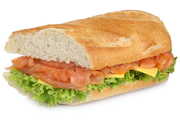 istock Sub sandwich baguette with salmon fish for breakfast isolated 519188908