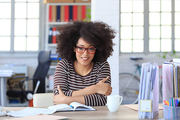 istock Businesswoman drinking coffee at the office 519192074