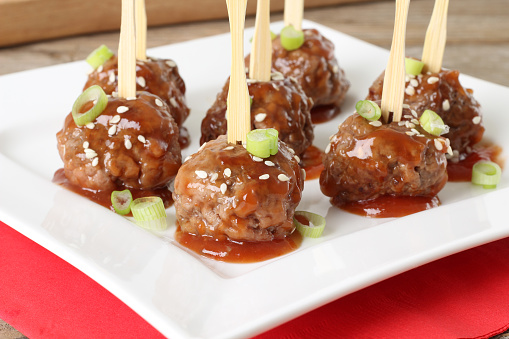 Cocktail beef meatballs in sweet and sour sauce.Also available in vertical.