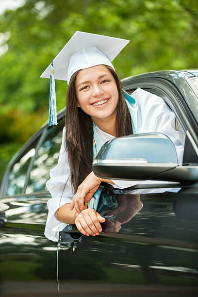 istock Happy graduate in cap and gown 519212227
