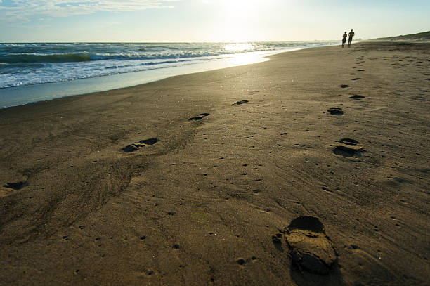 istock Italian sunset on the beach 519212287