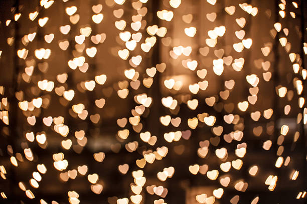 istock Defocused gold heart in technique bokeh 519214455