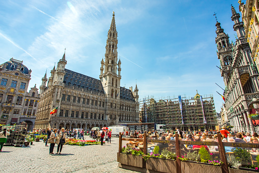 Brussels, Belgium - May 16, 2014: The Grand Place is the central square of Brussels. It is surrounded by opulent guildhalls and two larger edifices, the city's Town Hall.