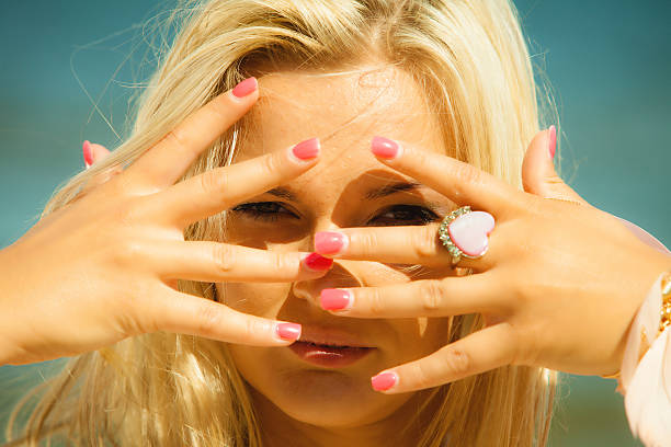 istock Girl framing her face with hands 519216952