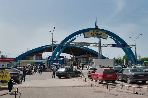 Korday, Kazakhstan - May 5, 2014: Border entry to Kazakhstan from Kyrgyzstan. This border checkpoint is one of the most important on the border between Kazakhstan and Kyrgyzstan, as there is the shortest road from Bishkek to Almaty (Highway M 39)