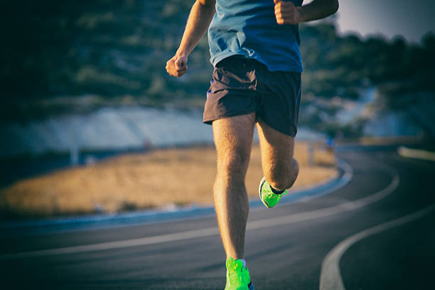 istock running outdoor on asphalt road 519218077