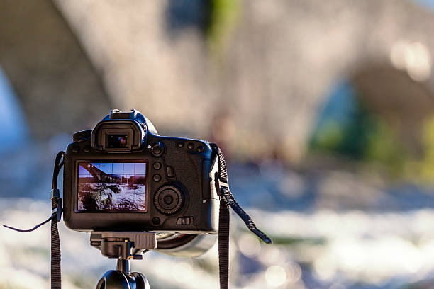 istock Taking photo with a DSLR camera 519218239