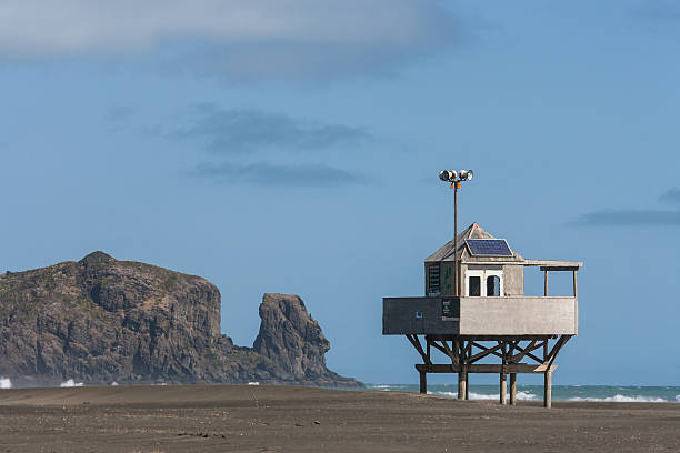 istock lifeguard hut on Bethells beach 519218903