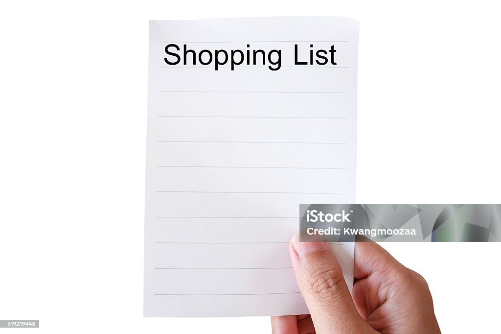 hand hold shopping list paper hand hold shopping list paper isolated on white background Adult Stock Photo