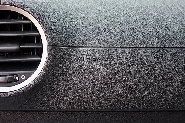 close up airbag sign in the car