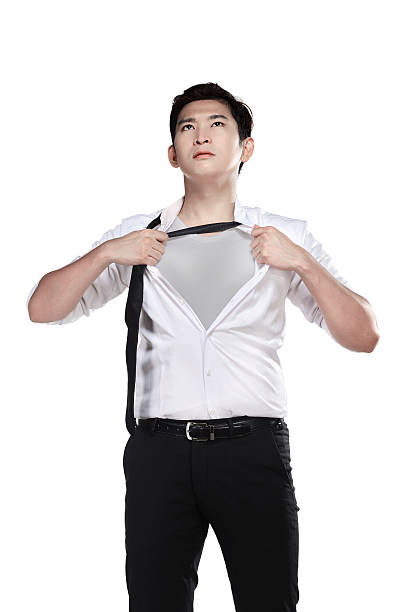 アジアの男性彼のシャツにオープン絶縁白の背景 - taking off ストックフォトと画像