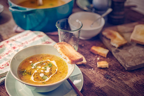 istock Delicous Chicken Soup with Carrots and Parsnips 519223002