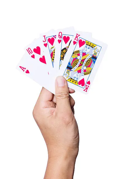 hand with royal flush on white